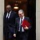 British Prime Minister Sir Keir Starmer (R) departs 10 Downing Street with his Deputy Prime Minister David Lammy (L) for Prime Minister's Questions (PMQs) at Parliament in London, Britain, 29 October 2025. (Reino Unido, Londres) EFE/EPA/ANDY RAIN