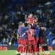 Los jugadores del Rayo celebran la victoria y "mantean" a 'Pacha' Espino al término del partido de LaLiga de fútbol que Real Sociedad y Rayo Vallecano disputaron en el Real Arena, en San Sebastián. EFE/Juan Herrero
