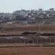 Un coche del Ejército de Israel en la frontera con Gaza. EFE/EPA/ATEF SAFADI