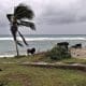 Un hombre observa sus vacas frente al mar en la carretera vía el poblado de Chivirico este martes, en Santiago de Cuba (Cuba). EFE/Ernesto Mastrascusa