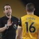 Foto de archivo del 19 de febrero de 2021 de David Coote (I), en su etapa de árbitro, durante un partido entre el Wolverhampton y el Leeds, de la Premier League. EFE/EPA/Alex Pantling / POOL EDITORIAL USE ONLY. No use with unauthorized audio, video, data, fixture lists, club/league logos or 'live' services. Online in-match use limited to 120 images, no video emulation. No use in betting, games or single club/league/player publications.[EDITORIAL USE ONLY. No use with unauthorized audio, video, data]