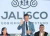 La secretaria de Turismo de Jalisco y exclavadista mexicana, Alejandra Orozco (i), el gobernador de Jalisco, Pablo Lemus (c), y el exmundialista mexicano, Carlos Salcido (d), participan en una rueda de prensa este lunes, en Ciudad de México (México). EFE/ Mario Guzmán
