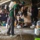 Fotografía del 14 de octubre de 2025 de un funcionario fumigando un campamento de desplazados en Petionville en Puerto Príncipe (Haití). EFE/ Mentor David Lorens