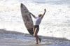 La ecuatoriana Dominic Barona celebra su victoria en la edición 39 del Corona Prosurf Circuit este domingo, en Isabela (Puerto Rico). EFE/ Thais Llorca