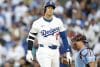 Shohei Ohtani durante el partido. Los Dodgers de Los Ángeles celebran tras clasificarse este jueves a la Serie de Campeonato de la Liga Nacional en la postemporada de las Grandes Ligas al abrir una diferencia de 3-1 en la serie con los Filis de Filadelfia al mejor de 5.EFE/EPA/CAROLINE BREHMAN