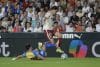 -El delantero del Valencia Diego López, y el defensa del Villarreal Sergi Cardona, durante el partido de la jornada 10 de LaLiga EA Sports, este sábado en el estadio de Mestalla en Valencia.-EFE/ Manuel Bruque