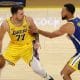 El escolta de Los Angeles Lakers Luka Doncic, con el balón, es defendido por el base de los Golden State Warriors, Stephen Curry (d), durante el partido que enfrentó a ambos conjuntos en Los Ángeles, California. EFE/EPA/ALLISON DINNER SHUTTERSTOCK OUT