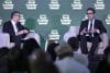 El ministro español de Economía, Comercio y Empresa, Carlos Cuerpo (d), habla junto al editor jefe de Live Journalism, Andy Browne (i), durante una charla titulada 'Desbloqueando el Crecimiento de la UE' en el marco de la edición de otoño de la Cumbre de la Economía Mundial este miércoles, en la sede de Semafor en Washington (Estados Unidos). EFE/ Lenin Nolly