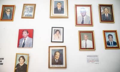 Retratos colgados en una pared del interior de la Asociación Cultural Musical Domingo Giuffra en Lima (Perú). EFE/ John Reyes Mejia