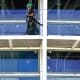 Una persona extiende cables en el exterior del Coliseo de Puerto Rico este viernes, en San Juan (Puerto Rico). EFE/ Thais Llorca