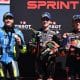 (I-D) Raúl Fernández, Marco Bezzecchi y Pedro Acosta celebran en el podio tras la carrera de MotoGP Sprint del Gran Premio de Motociclismo de Australia 2025 en Phillip Island. EFE/EPA/JOEL CARRETT