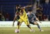 Allan Saint Maximin (i) de América disputa el balón con Luis Rey de Puebla este martes, durante un partido de la Liga MX entre América y Puebla en el estadio Ciudad de los Deportes, en Ciudad de México (México). EFE/ José Méndez