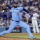 El lanzador de los Azulejos de Toronto Seranthony Domínguez prueba a un bateador de los Dodgers de Los Ángeles durante la octava entrada del quinto juego de la Serie Mundial de la MLB. EFE/EPA/ALLISON DINNER