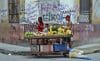 Personas venden alimentos en una calle el 10 de octubre de 2025, en La Habana (Cuba). EFE/ Ernesto Mastrascusa