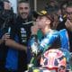 El piloto brasileño del equipo Italtrans Racing Team Diogo Moreira de Brasil, primer puesto en Moto2, celebra después de la carrera en el Gran Premio de Motociclismo de Indonesia en el Circuito de Mandalika, Indonesia. EFE/EPA/ADI WEDA