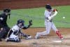 Alex Bregman (R) de los Medias Rojas golpea este juego la pelota durante el tercer juego de la Serie de Comodines de la Liga Americana de la MLB contra los Yanquis de New York EFE/EPA/SARAH YENESEL
