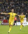 El jugador rumano Virgil Ghita celebra el 1-0 durante el partido del grupo H que han jugado Rumanía y Austria en Bucarest, Rumanía. EFE/EPA/ROBERT GHEMENT
