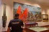 MADRID, 12/10/2025.- Dos activistas del movimiento de desobediencia civil no violenta Futuro Vegetal han lanzado este domingo pintura roja biodegradable sobre un cuadro en el Museo Naval de Madrid, en un acto de protesta por la celebración de la Fiesta Nacional y para denunciar el actual neocolonialismo extractivista que explota sus recursos naturales. EFE/ Gaspar Ruiz-canela
