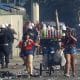 Aficionados de Flamengo reaccionan durante un enfrentamiento con la Policía de Brasil en Río de Janeiro (Brasil). EFE/ Antonio Lacerda