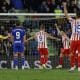 Los jugadores del Atlético de Madrid celebran su primer gol en el partido de LaLiga entre el Getafe y el Atlético de Madrid, este domingo en el Coliseo. EFE/ JJ Guillén