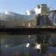 El Museo Guggenheim Bilbao, diseñado por el arquitecto Frank O. Gehry junto a la ría de Bilbao, en la etapa final de sus obras en julio de 1997. EFE/Txema Fernández