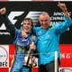 El español Fernando Alonso (i) y el director del equipo Renault, el italiano Flavio Briatore, celebran la conquista del mundial de pilotos y el título de constructores, que certificó con su victoria en el Gran Premio de China, el 16 de octubre de 2005. EFE/Gero Breloer