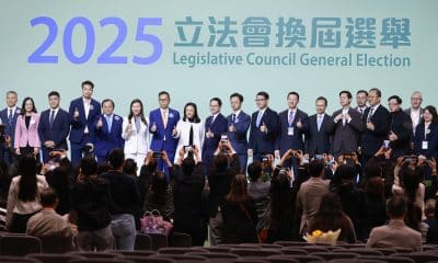 HONG KONG (China), 07/12/2025.- Candidates of the Election Committee Constituency stand at the stage waiting for results following the Legislative Council General Election of the 07 of December, in Hong Kong, China, 08 December 2025. Hong Kong's 'patriots-only' Legislative Council election is held as the city mourns the deadly Wang Fuk Court fire in Tai Po, with public calls for accountability amid lingering questions about the tragedy. (Elecciones) EFE/EPA/MAY JAMES