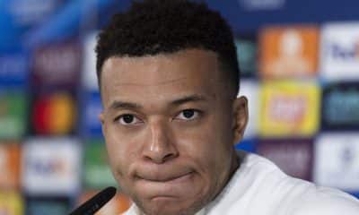 El delantero del Real Madrid, Kylian Mbappé durante la rueda de prensa tras el entrenamiento del equipo de este lunes en Valdebebas previo al partido de Liga de Campeones contra el AS Mónaco. EFE/Sergio Pérez