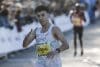 El atleta español Said Mechaal tras cruzar la línea de meta de la carrera de 10k de Valencia, en la que estableció una nueva mejor marca española. EFE/Manuel Bruque
