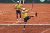 Diego Hidalgo (d) y Gonzalo Escobar (i) de Ecuador se enfrentan a Jordan Thompson y Rinky Hijikata de Australia, en un partido de la Copa Davis este domingo en Quito (Ecuador). EFE/José Jácome
