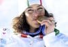 La italiana Federica Brignone celebra su títutlo de campeona olímpica de gigante de esquí alpino de los Juegos de Milán-Cortina d'Ampezzo (Italia),EFE/EPA/DANIEL DAL ZENNARO
