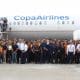 Trabajadores de la aerolínea Copa posan durante un evento en el Aeropuerto Internacional de Tocumen en Ciudad de Panamá (Panamá). EFE/ Carlos Lemos