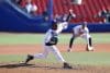 El lanzador Jefry Yan de los Leones del Escogido, campeón de República Dominicana, en plena acción durante el juego de la segunda jornada de la Serie del Caribe contra Cagrejeros de Santurce de Puerto Rico en el Estadio Panamericano de Guadalajara. EFE/ Francisco Guasco