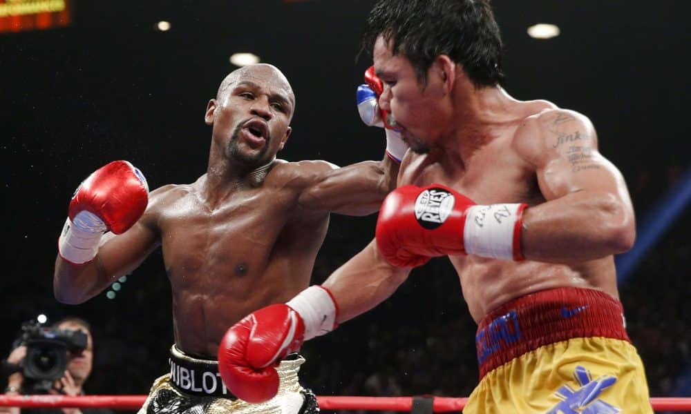El estadounidense Floyd Mayweather Jr. (i) y el filipino Manny Pacquiao (d), en una imagen de archivo. EFE/Esther Lin