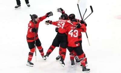 Los jugadores de Canadá celebran un gol. EFE/EPA/FAZRY ISMAIL