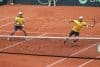 Diego Hidalgo (d) y Gonzalo Escobar (i) de Ecuador se enfrentan a Jordan Thompson y Rinky Hijikata de Australia, en un partido de la Copa Davis este domingo en Quito (Ecuador). EFE/José Jácome
