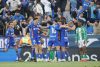 El centrocampista del Getafe Kiko Femenía celebra con sus compañeros tras marcar el primer gol durante el partido de LaLiga entre el Getafe y el Betis, este domingo en el Coliseo. EFE/Zipi
