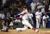 Juan Soto, de República Dominicana, batea durante un partido de exhibición entre la selección de República Dominicana y los Tigres de Detroit en el Estadio Quisqueya Juan Marichal, en Santo Domingo (República Dominicana). EFE/Orlando Barría
