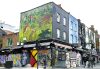 -La National Gallery de Londres junto con Global Street Art transforman alguna de sus pinturas más importantes en arte callejero e inaguran su primer mural '¡Sorprendido! Tigre en una tormenta tropical' de Henri Rousseau en el barrio de Camden.-EFE/ Guillermo Garrido
