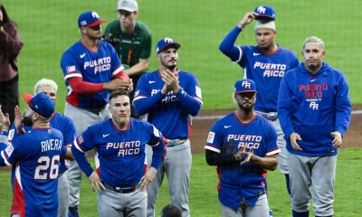 Jugadores de Puerto Rico se ven decepcionados al perder frente a Italia 8-6 en cuartos de final del Clásico Mundial de Béisbol 2026, en un partido jugado en el estadio Daikin Park, en Houston (Estados Unidos). EFE/ Carlos Ramírez