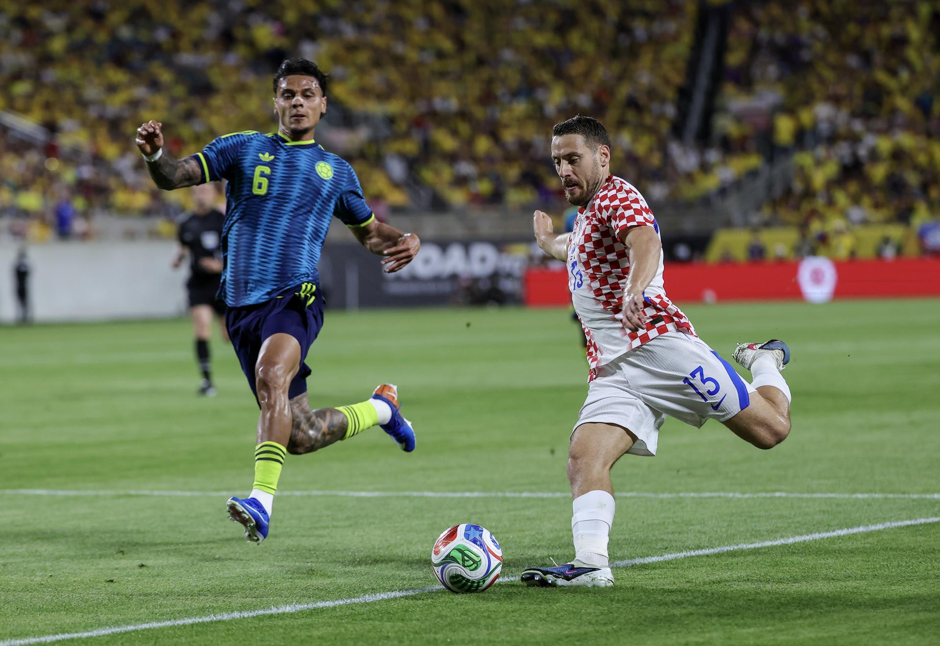 El croata Nikola Vlasic en acción contra el colombiano Richard Rios durante el partido amistoso internacional entre Colombia y Croacia en Orlando, Florida (EE.UU). EFE/CRISTÓBAL HERRERA-ULASHKEVICH
 
//////////
 
ORLANDO (United States), 26/03/2026.- Nikola Vlasic (R) of Croatia in action against Richard Rios of Colombia during the international friendly match between Colombia and Croatia in Orlando, Florida, USA, 26 March 2026. (Futbol, Amistoso, Croacia) EFE/EPA/CRISTOBAL HERRERA-ULASHKEVICH
