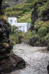 El agua corre con fuerza por el barranco de Las Angustias, en La Palma, tras las intensas precipitaciones que ha dejado en la isla la borrasca Therese. EFE/Luis G. Morera