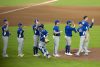 Jugadores de Italia celebran este miércoles, al finalizar un partido del Clásico Mundial de Béisbol entre México e Italia en el estadio Daikin Park, en Houston (Estados Unidos). EFE/ Carlos Ramírez
