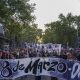 Mujeres sostienen una bandera durante una marcha por la conmemoración del Día Internacional de la Mujer (8M) este domingo, Montevideo (Uruguay). EFE/ Meri Parrado