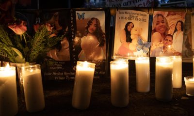 Fotografía que muestra carteles con imágenes de las víctimas de la discoteca Jet Set durante una vigilia este martes, al conmemorarse un año de la tragedia que causó la muerte de 236 personas y dejó heridas a más de 180 en Santo Domingo (República Dominicana). EFE/Orlando Barría