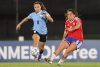 Esperanza Pizarro (i), de Uruguay, disputa el balón con Yastin Jiménez, de Chile, en un partido de la Liga de Naciones Femenina entre Uruguay y Chile en el estadio Centenario en Montevideo (Uruguay). EFE/Gastón Britos
