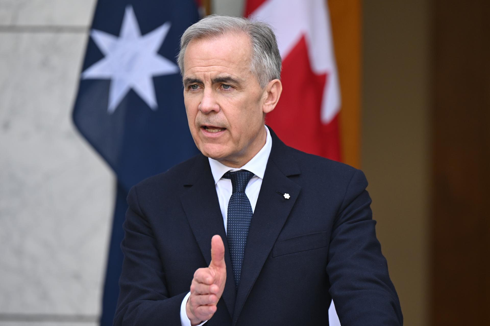 Fotografía de archivo del 5 de marzo de 2026 del primer ministro de Canadá, Mark Carney, hablando en una rueda de prensa en el Parlamento de Canberra (Australia). EFE/EPA/ EFE/ Lukas Coch