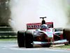 Imagen de archivo del 14 de agosto de 1999, en la que puede verse al entonces piloto italiano de Fórmula Uno Alex Zanardi, al volante de Williams, durante un Gran Premio. EFE/ ATTILA KISBENEDEK
