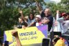 La presidenta encargada de Venezuela, Delcy Rodríguez, saluda junto al ministro de Interior y Justicia, Diosdado Cabello, durante una caravana este jueves, en Caracas (Venezuela). EFE/ Ronald Peña R
