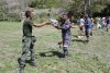 Personas descargan ayudas humanitarias de un helicóptero este lunes, en La Guaira (Venezuela). EFE/ Ronald Peña R
